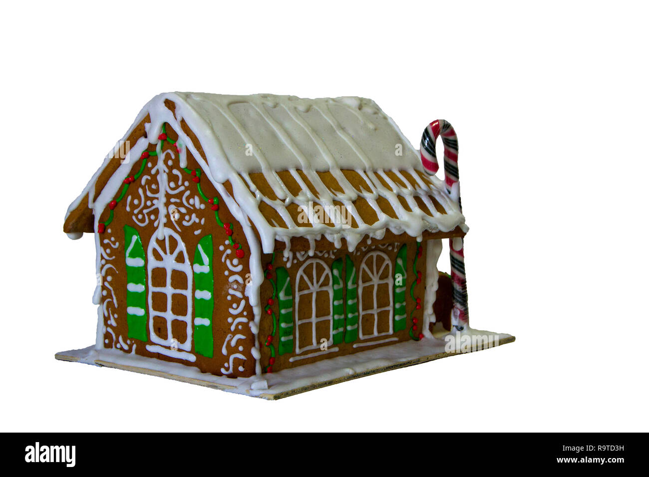 Gingerbread House colorée sur le livre blanc backgrounde. Ambiance de Noël Banque D'Images