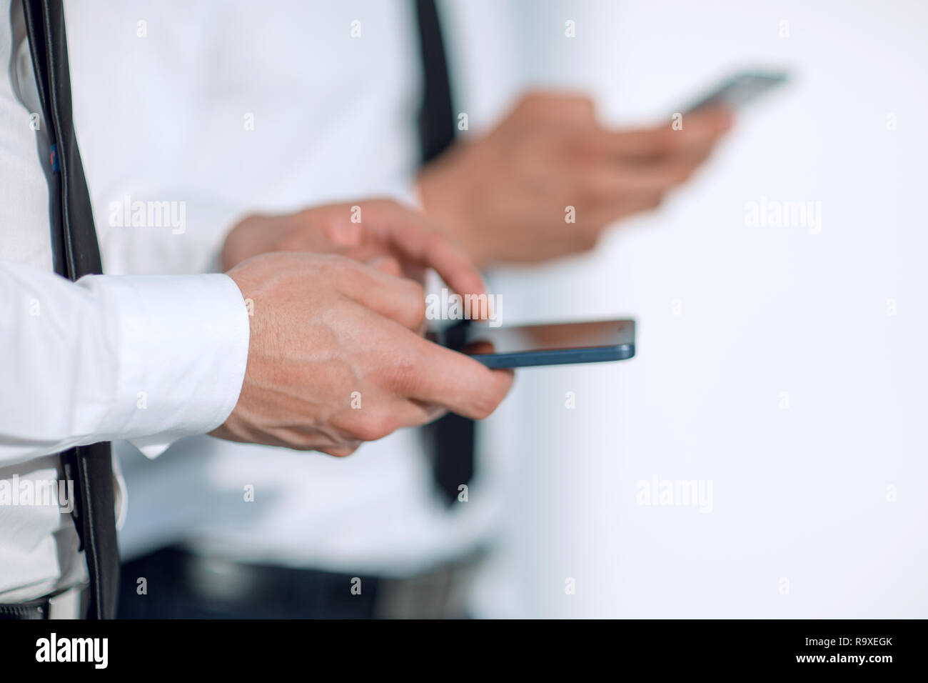 Perdre des téléphones dans les mains Banque D'Images