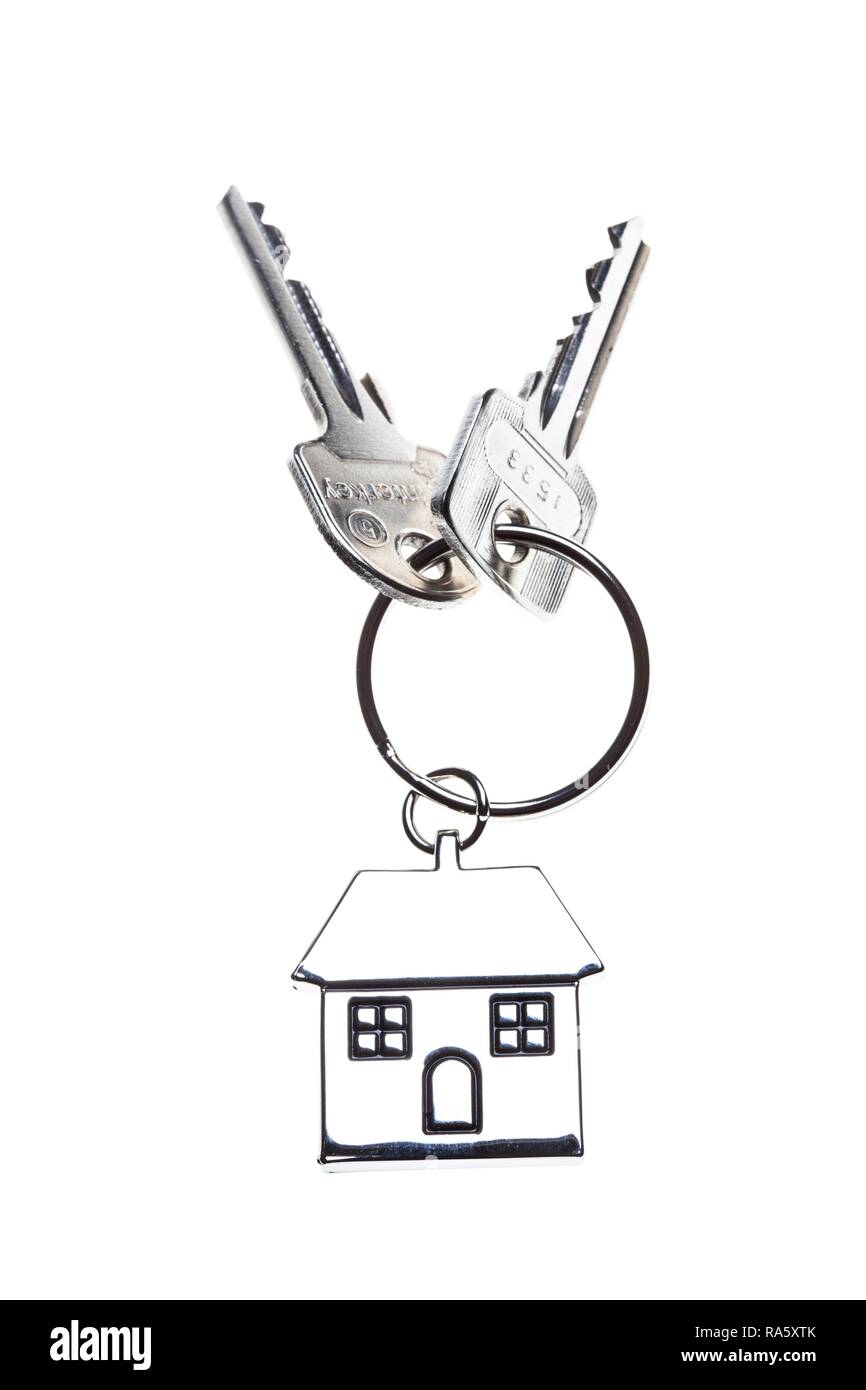 Deux clés avec une clé en métal en forme de tag comme une maison, image symbolique pour l'accueil, de l'immobilier Banque D'Images