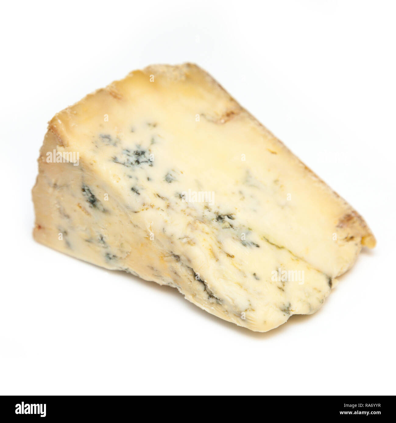 Le fromage stilton bleu mature isolated on a white background studio. Banque D'Images