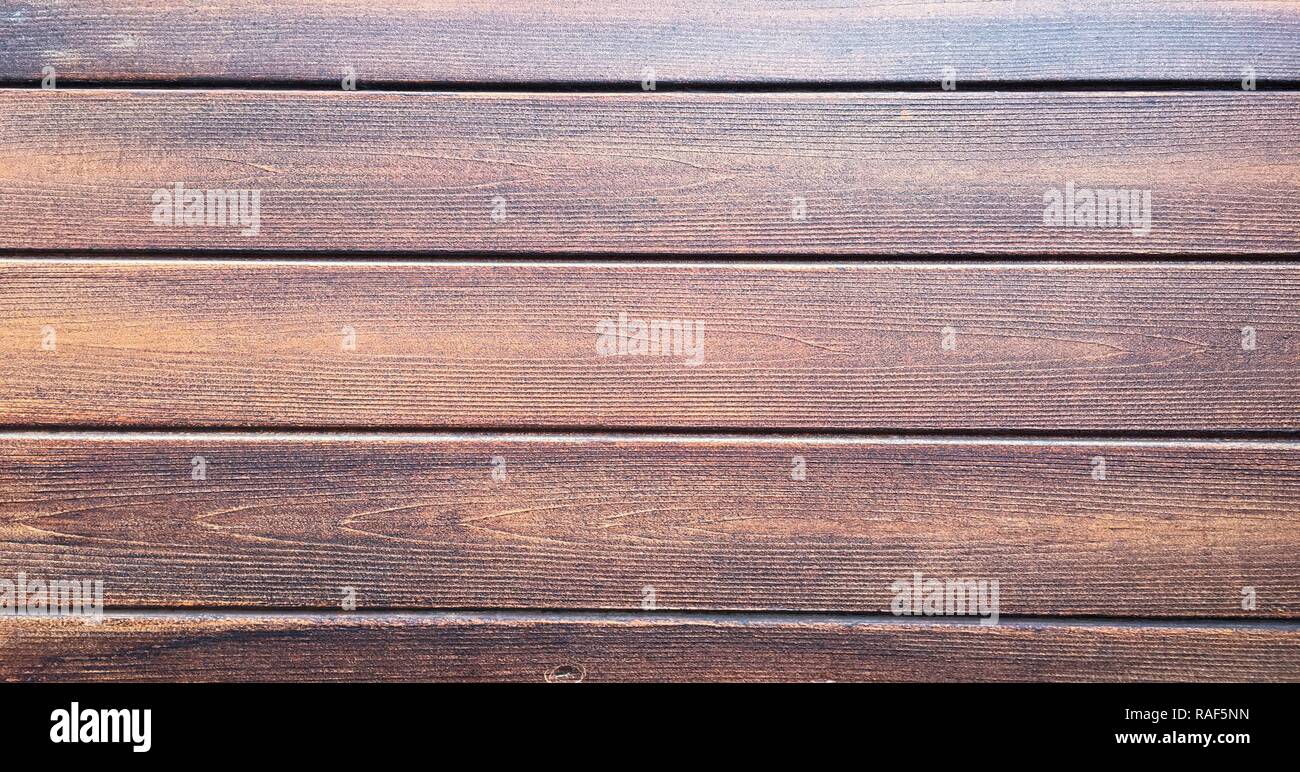 La texture en bois brun foncé, fond de chêne bois patiné distressed lavé avec peinture vernis pâle montrant la texture woodgrain. laver les planches de bois Banque D'Images