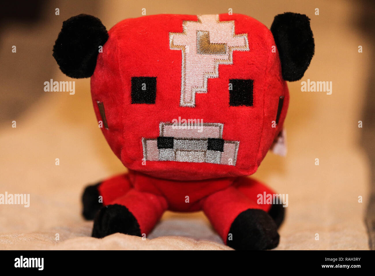 peluche vache rouge
