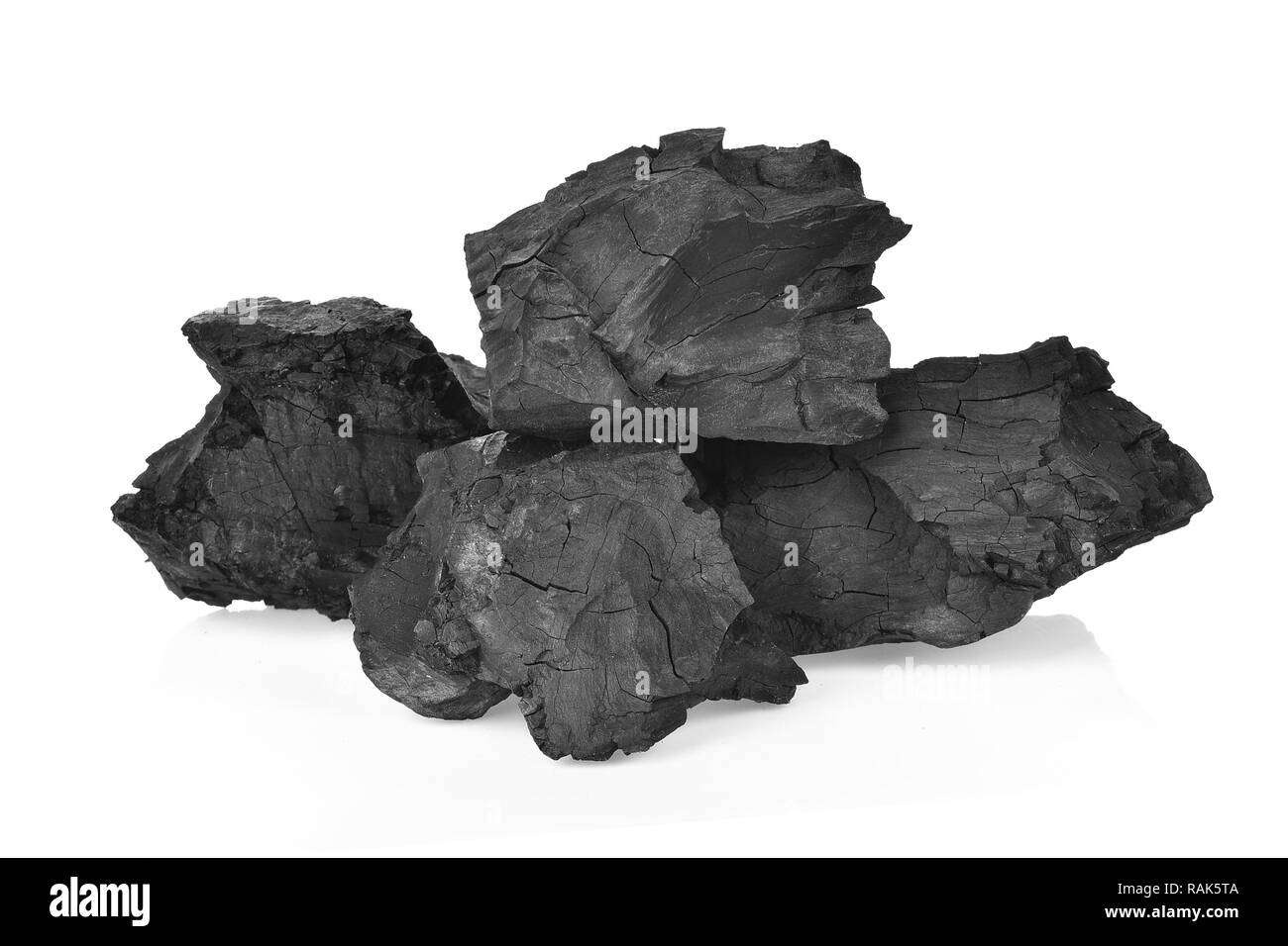 Charbons ardents sur fond blanc Banque D'Images
