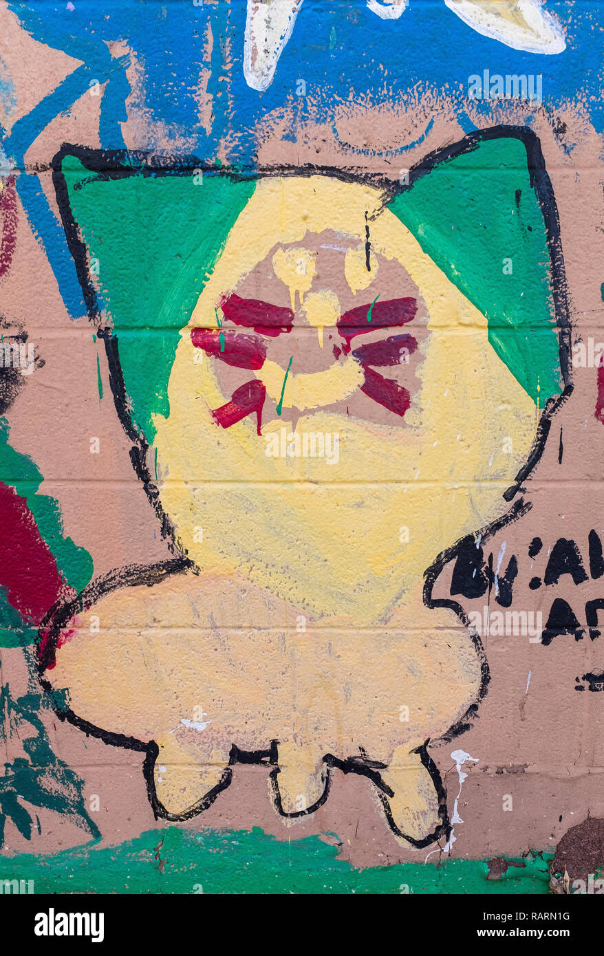 Street art en plein air pour les enfants de cat in Barelas, New Mexico par Alanna Armijo Banque D'Images