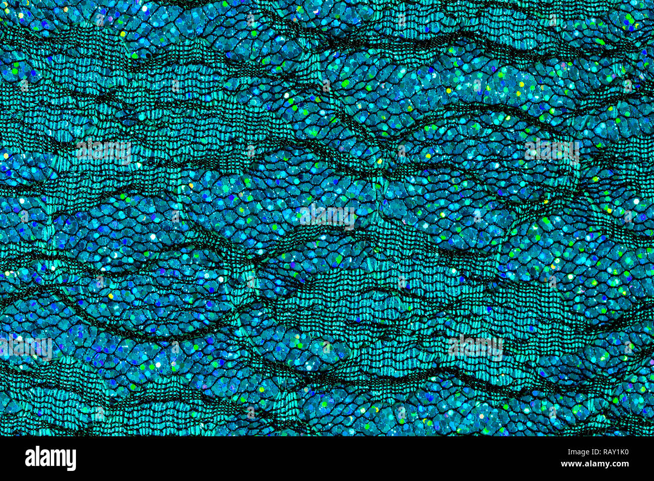 Résumé fond de paillettes bleu sur la dentelle qui ressemble à de l'eau ou les écailles de poisson Banque D'Images