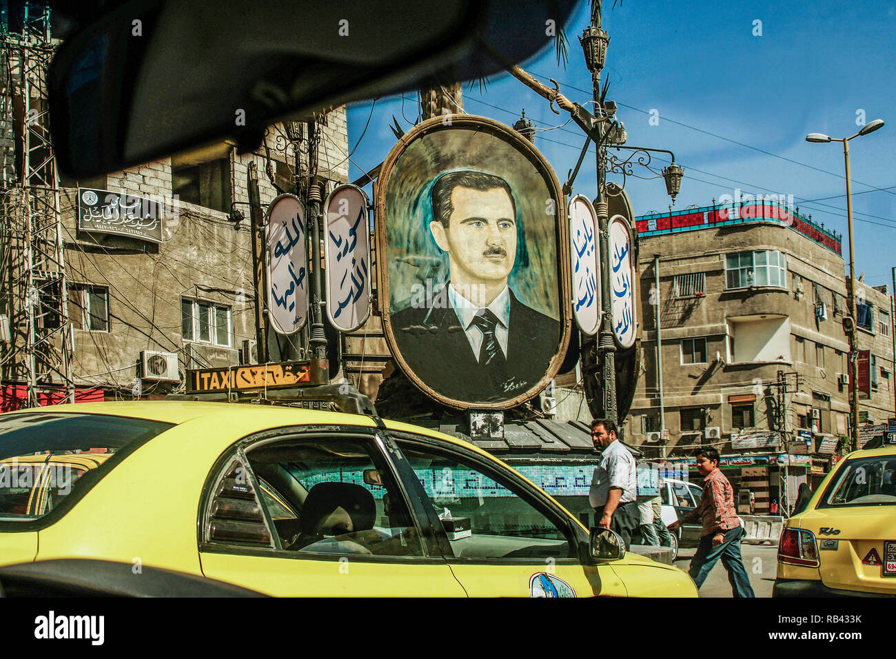 Le trafic à Damas, sous l'oeil du Président Bachar al-Assad. Damas. La Syrie, au Moyen-Orient Banque D'Images