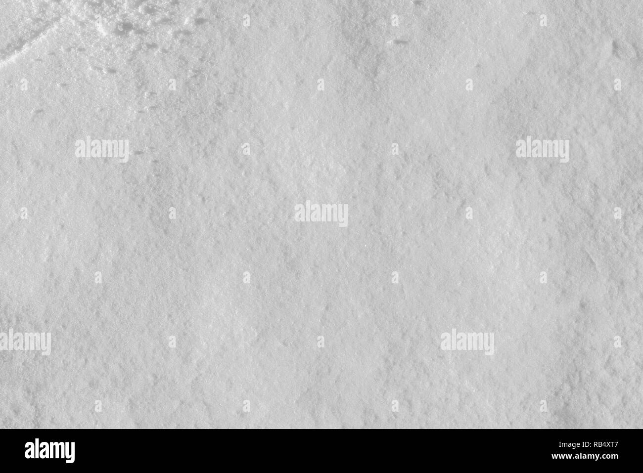 La texture de la neige blanc comme arrière-plan. Banque D'Images