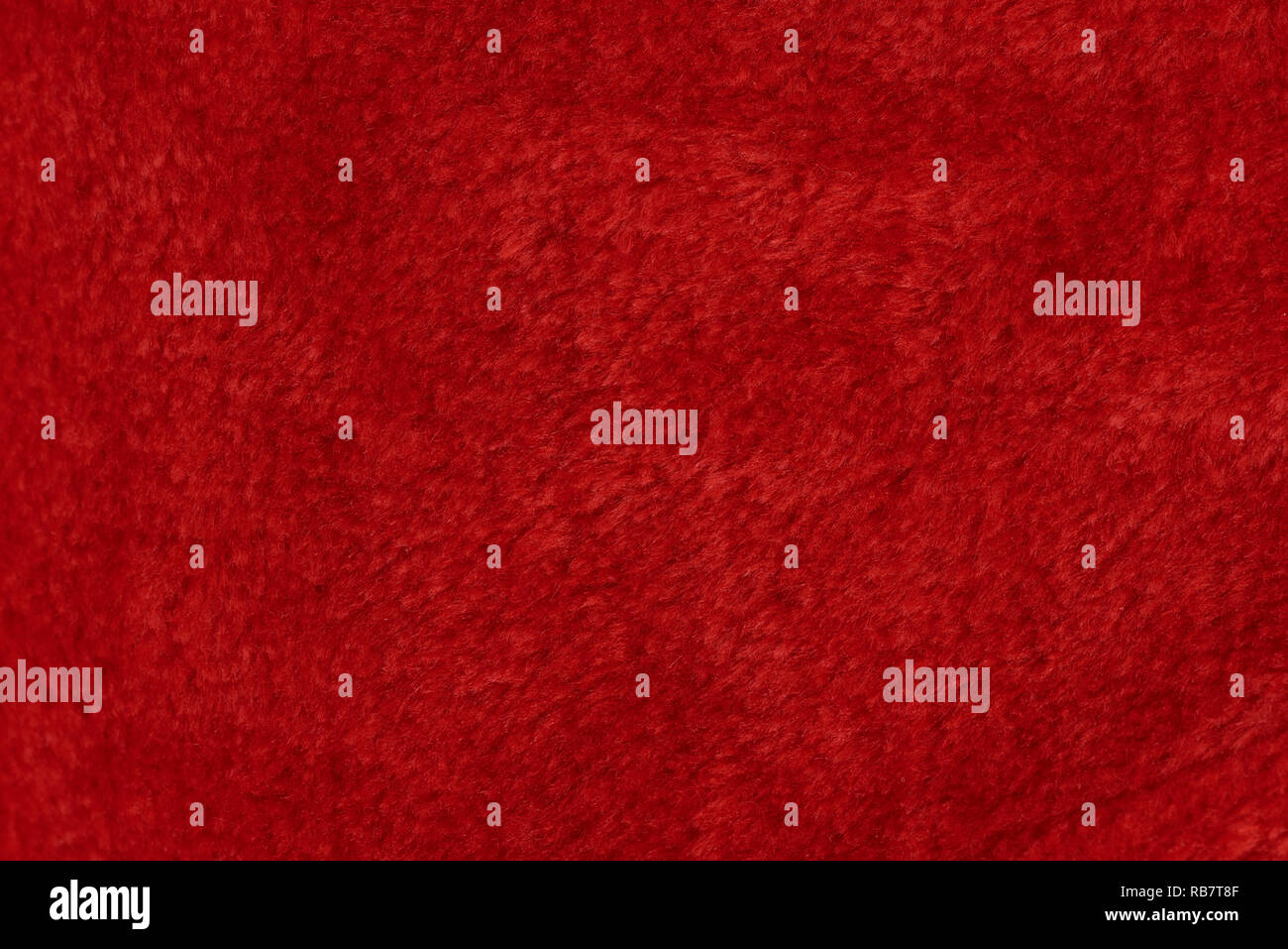 Fourrure rouge texture background. Surface douce en coton laine Banque D'Images