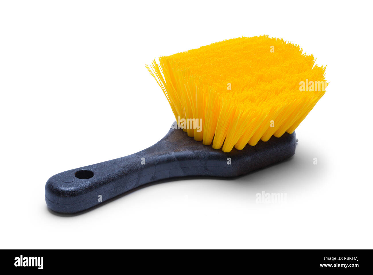 Petite brosse de nettoyage isolé sur fond blanc. Banque D'Images