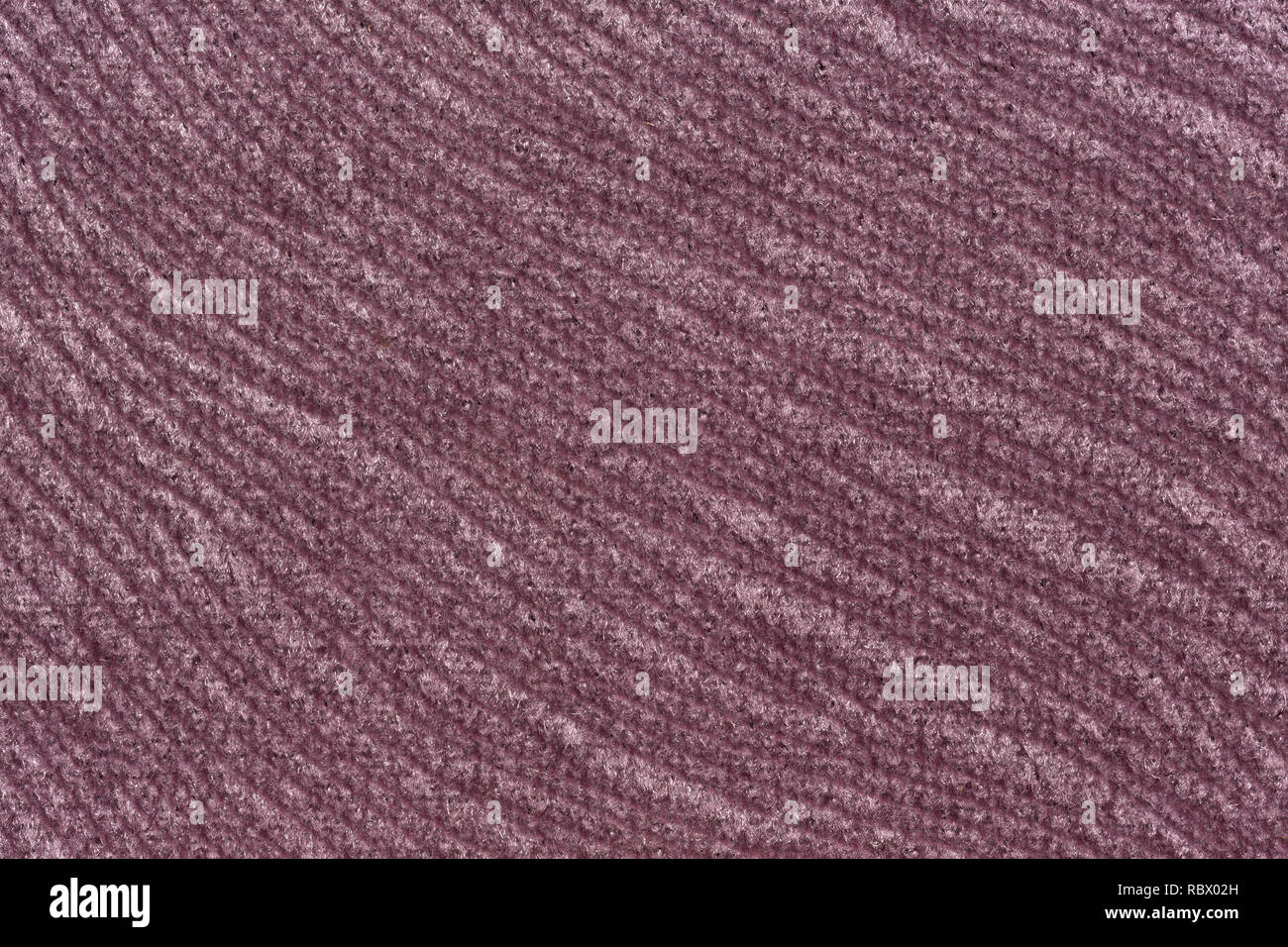 Fond tissu violet clair de manière impressionnante sur la macro. Banque D'Images