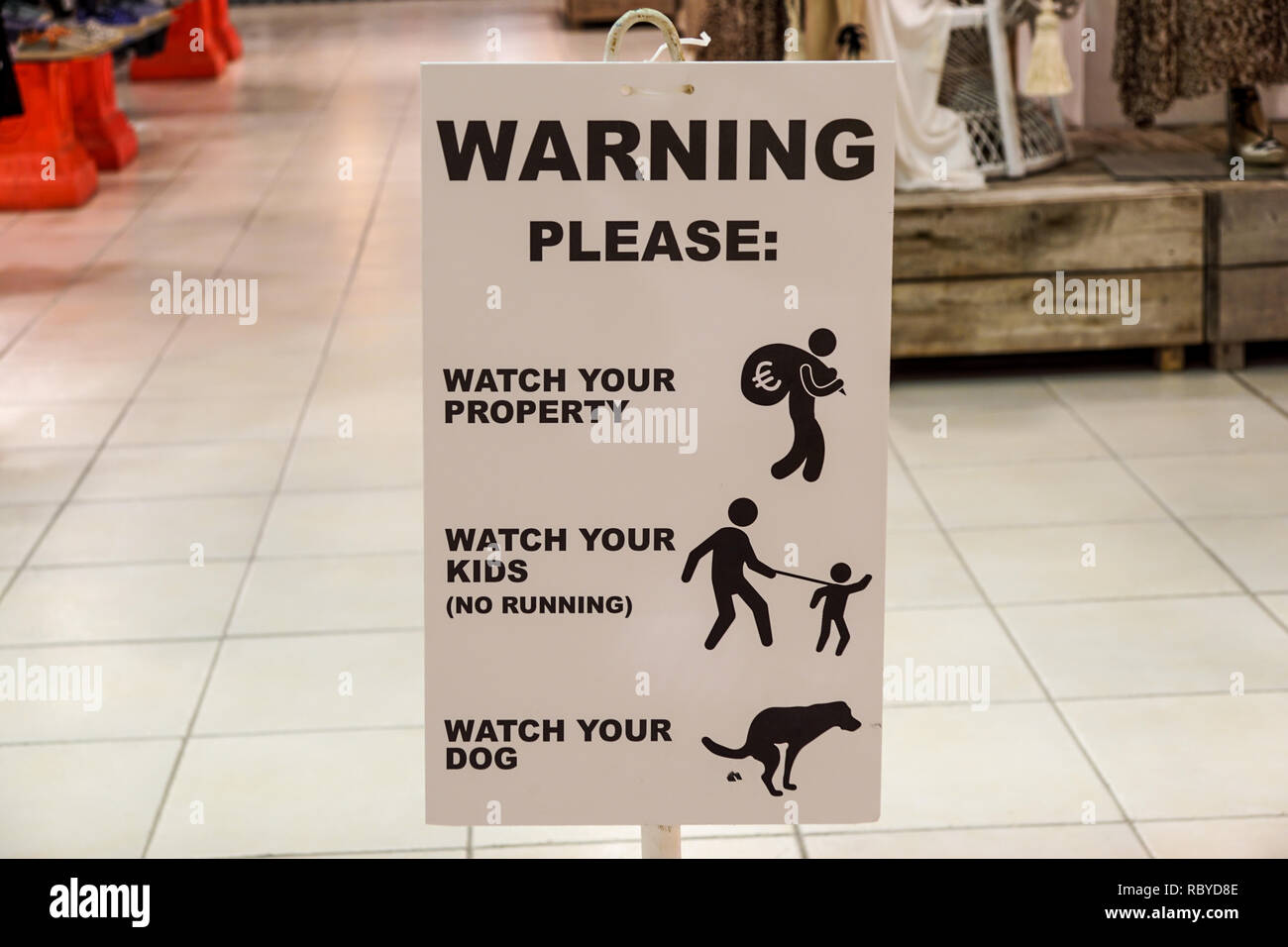 Attention l'intérieur signe de détresse par store Banque D'Images