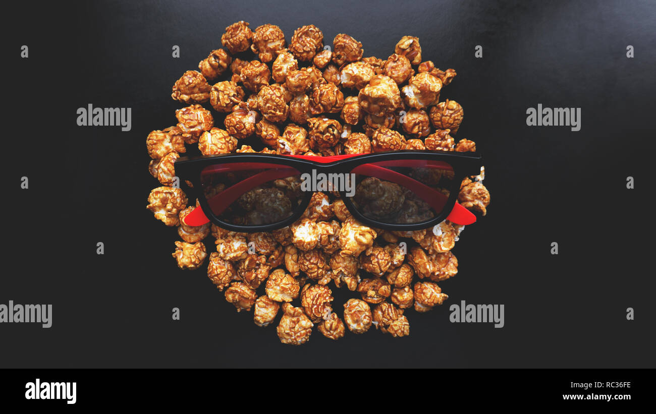 Résumé de l'image viewer, lunettes 3D et du popcorn sur fond noir Banque D'Images