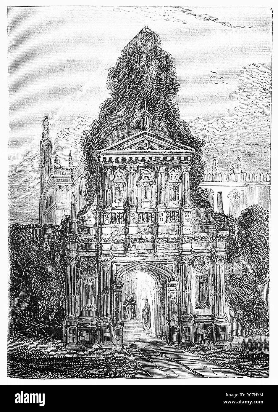 Le 16e siècle 'Porte de l'honneur" indiquant les cadrans solaires aux Gonville & Caius College, un collège constituant de l'Université de Cambridge à Cambridge, Angleterre. Il a été conçu par le Dr Caius avec Pierre de détail classique, sous la forme d'un arc de triomphe encore de très petite échelle. La porte, avec la pierre d'accompagnement et de murs en briques rouges du Sud, constitue la gamme de Caius Cour. Banque D'Images