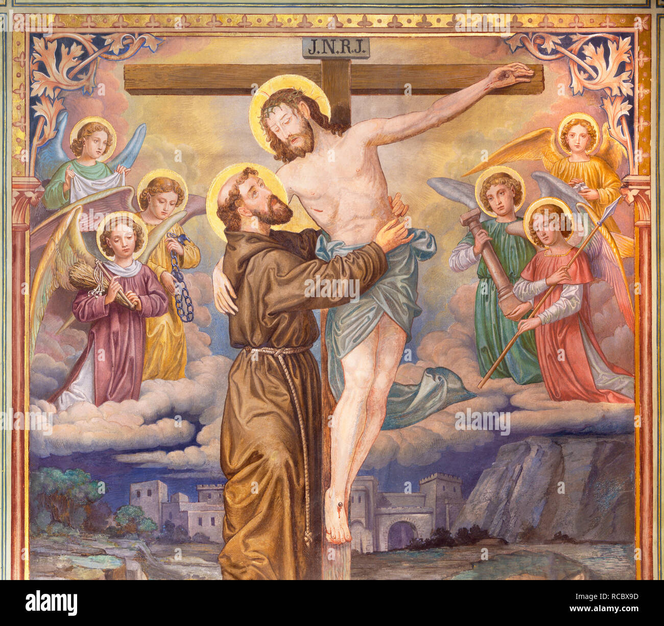 PRAGUE, RÉPUBLIQUE TCHÈQUE - le 12 octobre 2018 : la peinture idilic symbolique de Saint François d'assise et Jésus crucificted Banque D'Images