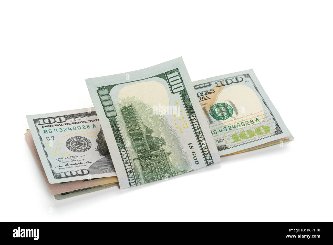 Pile de billets en dollars américains, isolé sur fond blanc, clipping path-inclus Banque D'Images