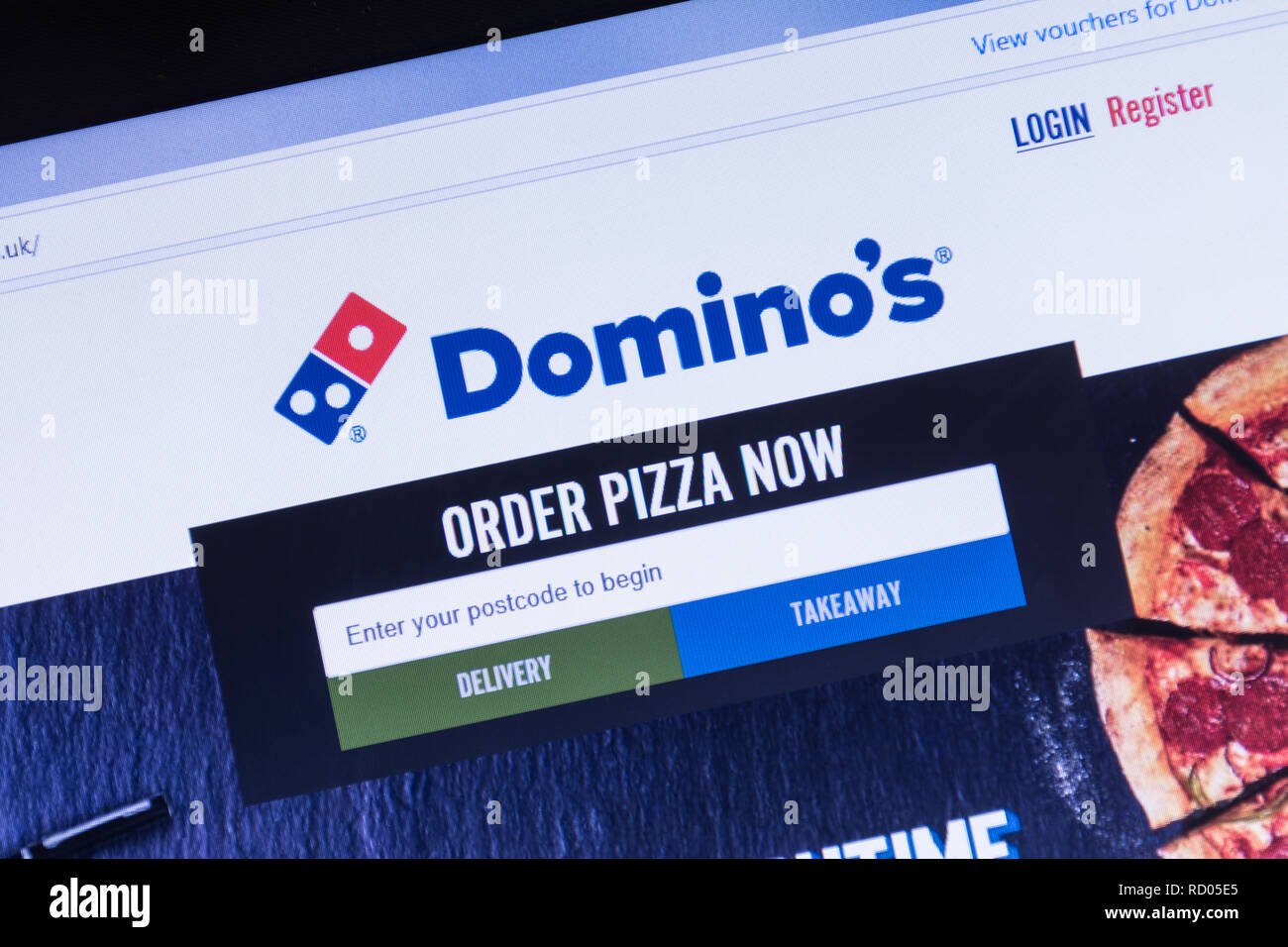 Site web de Domino's Pizza capture d'écran sur un ordinateur portable. Publicité pour la restauration rapide à emporter Banque D'Images