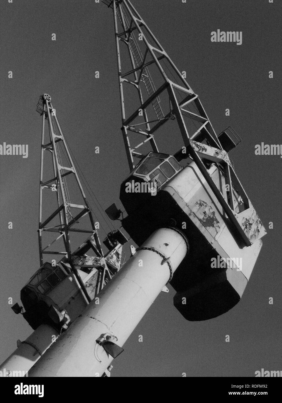 Vieux grues de chargement Banque D'Images