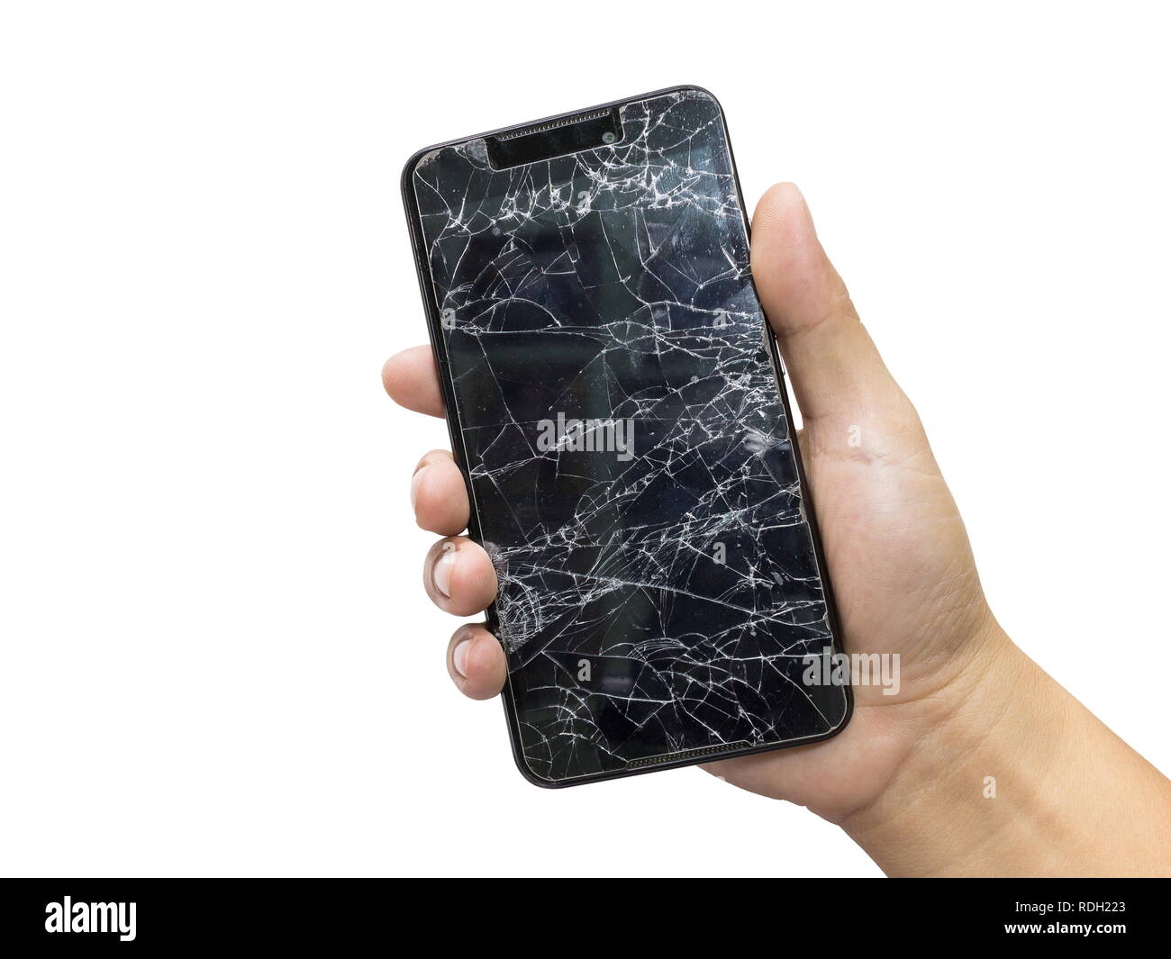 Homme tenant un téléphone portable noir et l'écran broken isolé sur un fond blanc. Banque D'Images