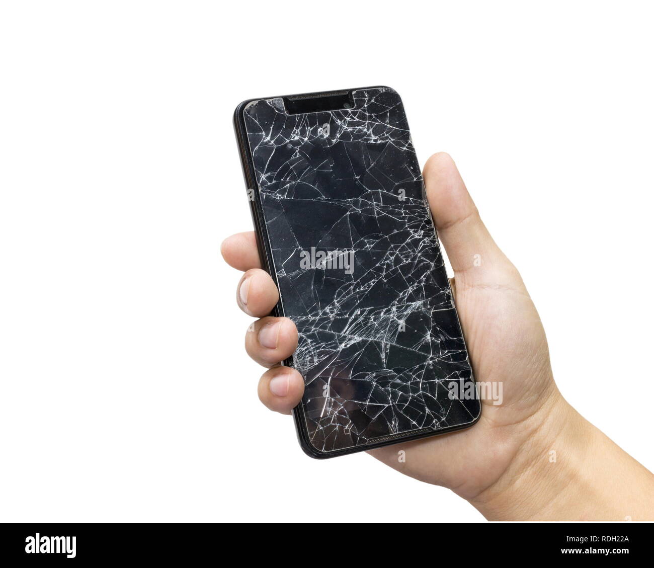 Homme tenant un téléphone portable noir et l'écran broken isolé sur un fond blanc. Banque D'Images