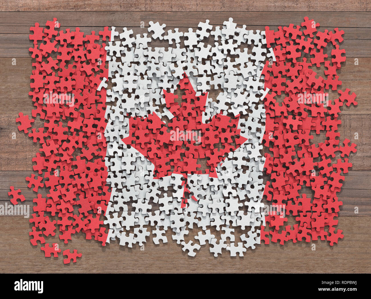 Drapeau du Canada composée de plusieurs pièces de puzzle denteux, illustration. Banque D'Images