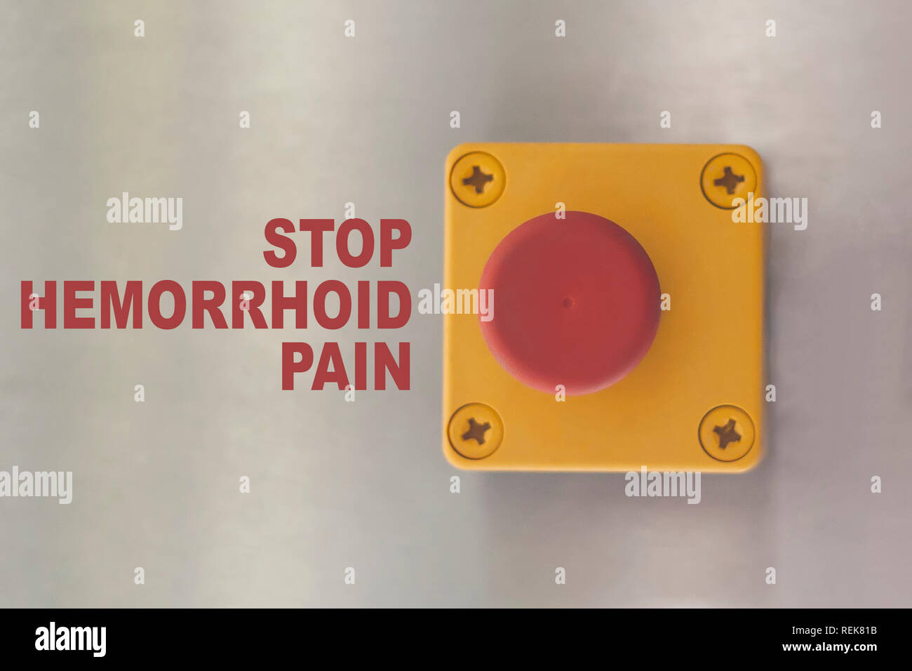 Stop hémorroïdes image conceptuelle. Bouton de commutation industrielle avec texte : arrêter la douleur hémorroïdes Banque D'Images