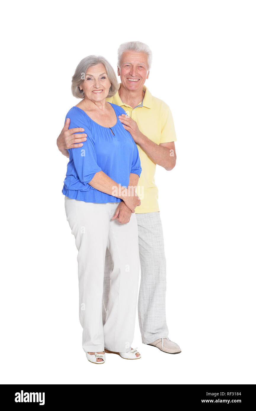 Happy senior couple posing on white background Banque D'Images