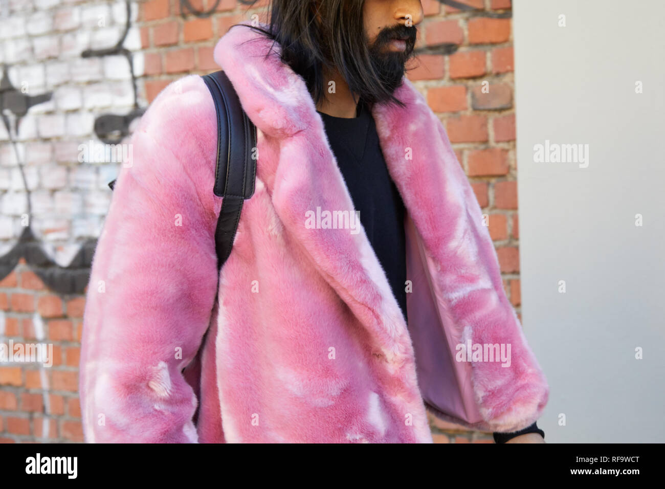 MILAN, ITALY - JANUARY 13, 2019: Woman with pink fur coat and brown Louis  Vuitton bag before John Richmond fashion show, Milan Fashion Week street  sty Stock Photo - Alamy