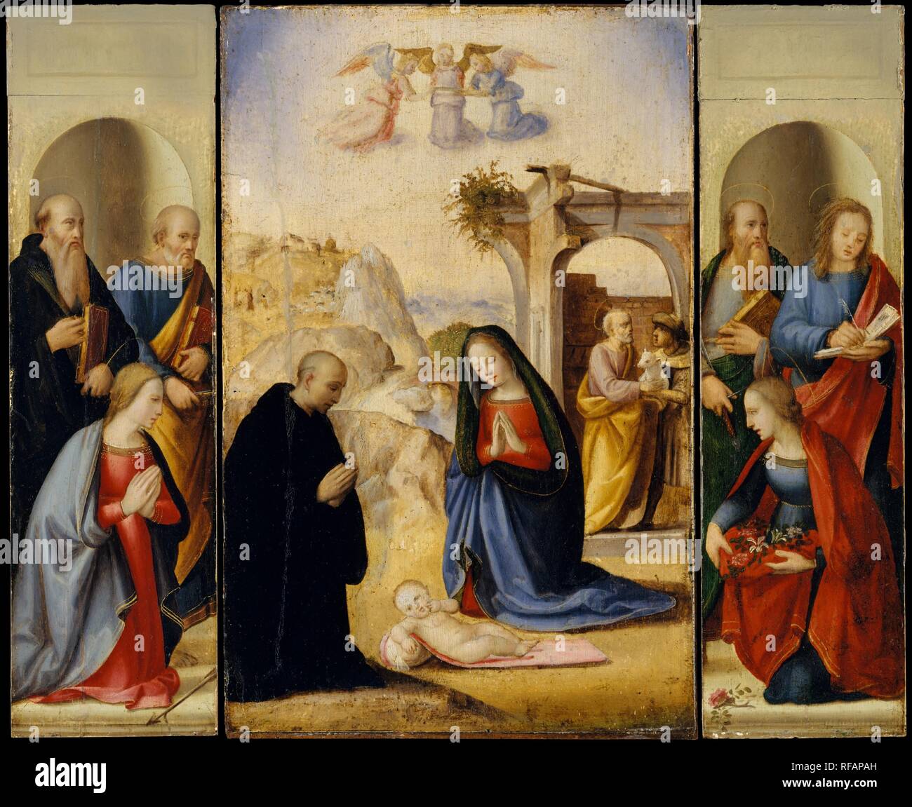 La Nativité avec les Saints. Artiste : Paul Kane (Italien, Florence Florence 1483-1561). Dimensions : panneau central 14 x 9 in. (35,6 x 22,9 cm) ; chaque aile 14 x 4 in. (35,6 x 10,2 cm). Ridolfo était le fils de Domenico Ghirlandaio, et comme son père était à la tête d'un atelier qui s'est disposé à entreprendre une variété de tâches, de la décoration d'une chapelle pour les petits retables. La destination de ce travail n'est pas connue, mais la présence de Saint Benoît dans l'une des ailes et d'une abbaye bénédictine à genoux au premier plan du panneau central suggère qu'il a été pris pour une abbaye bénédictine mona Banque D'Images