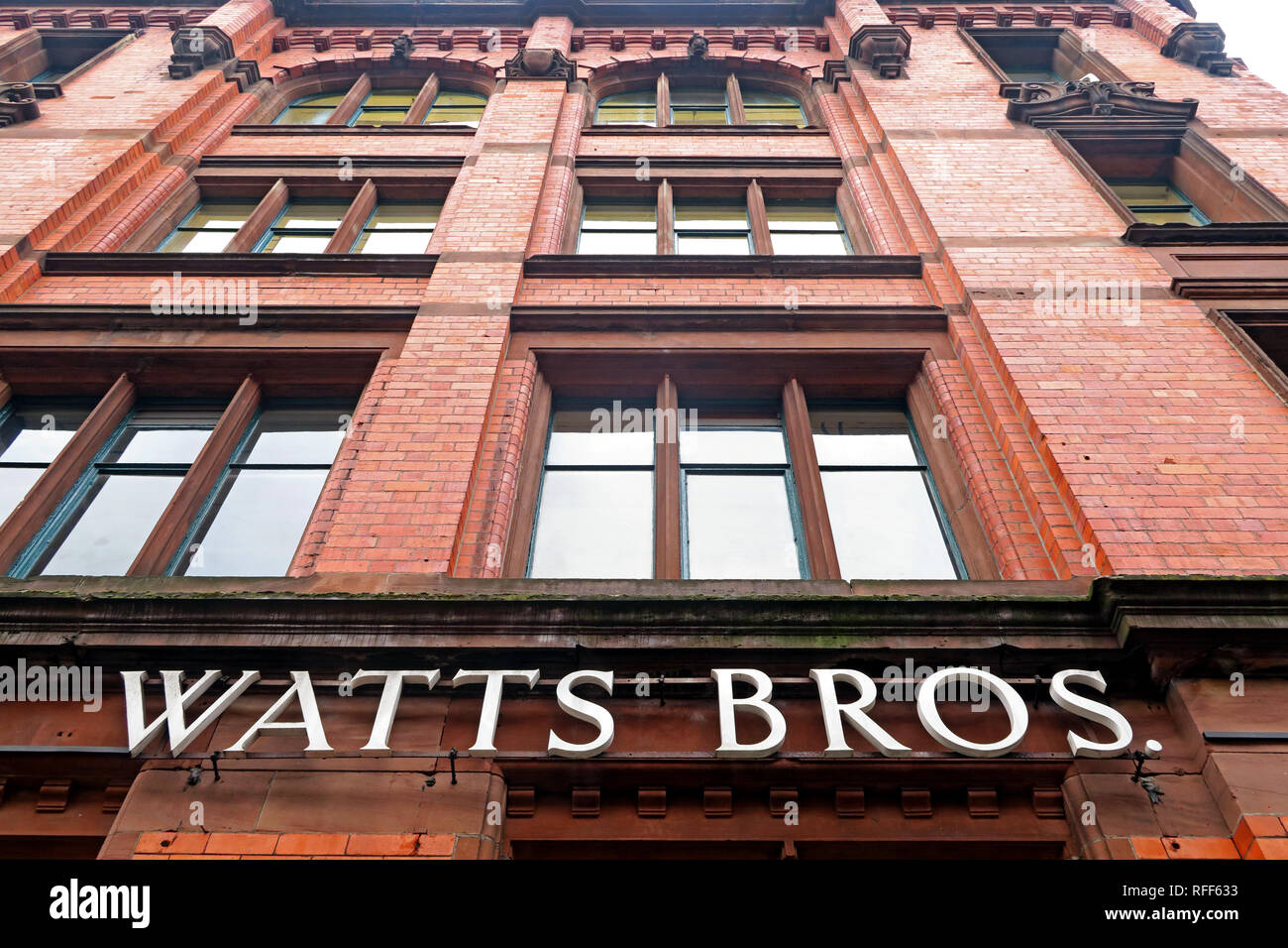Watts Brothers bâtiment, quincaillerie et entrepôt de meubles, maintenant bureaux à Bunsen St, Manchester, Angleterre, Royaume-Uni, M1 1DW Banque D'Images