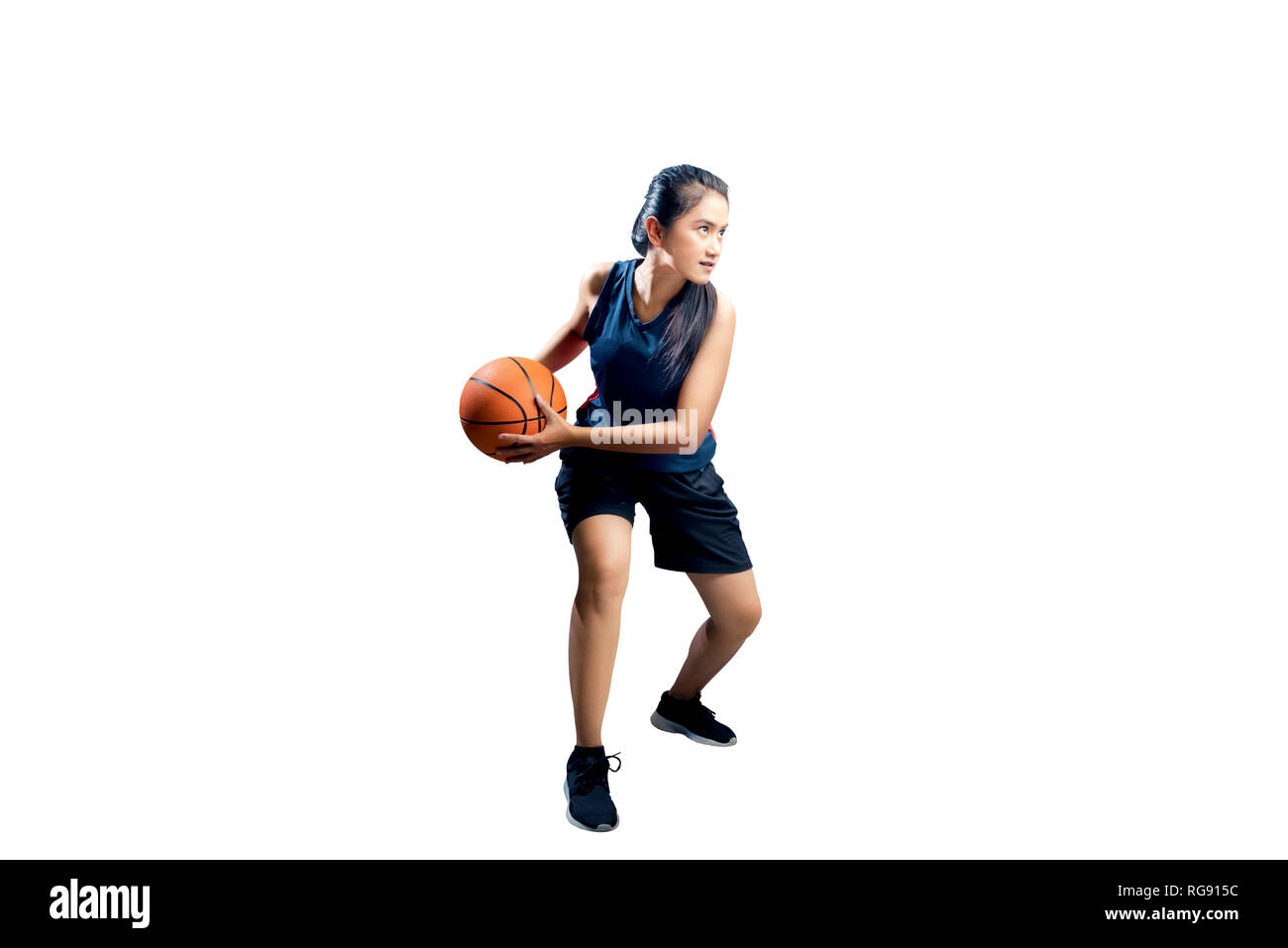Fille qui joue au basket Banque d'images détourées - Alamy