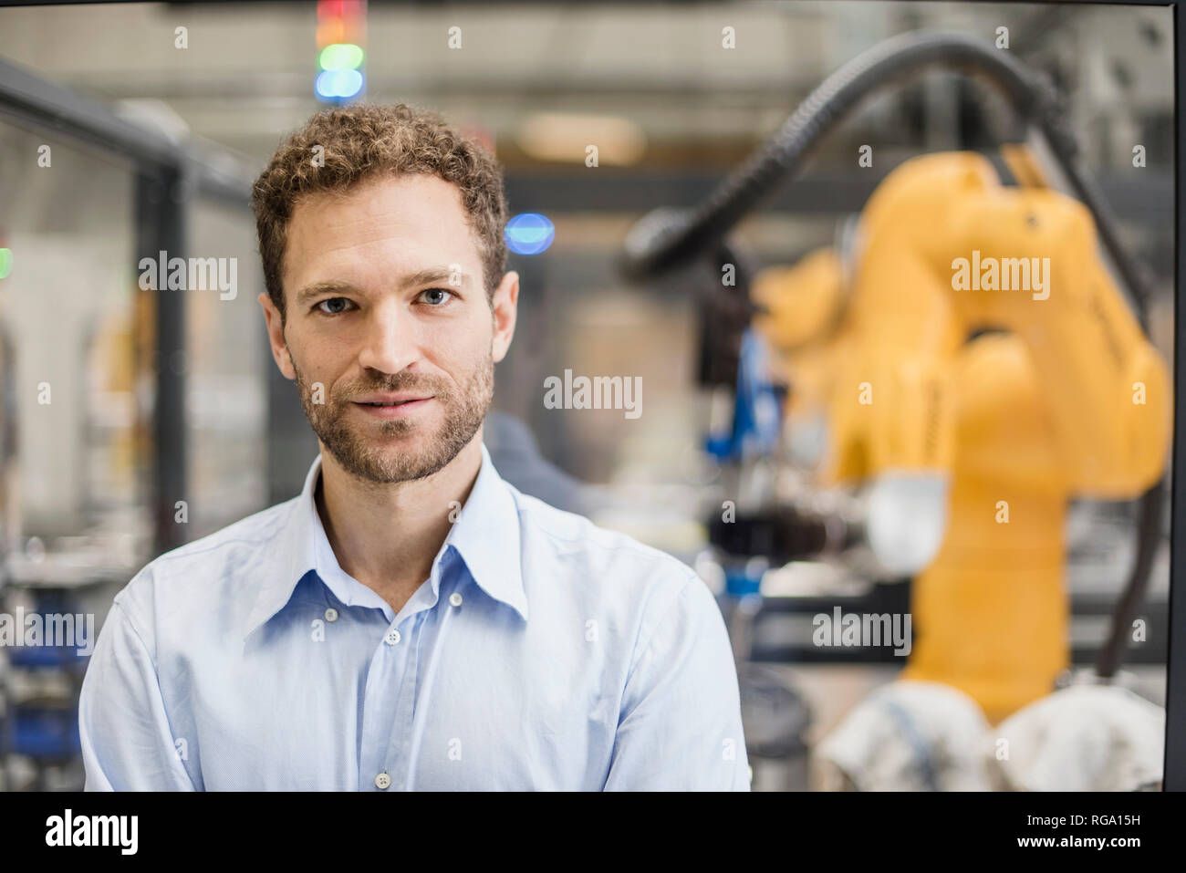Businessman working in high tech company, portrait Banque D'Images