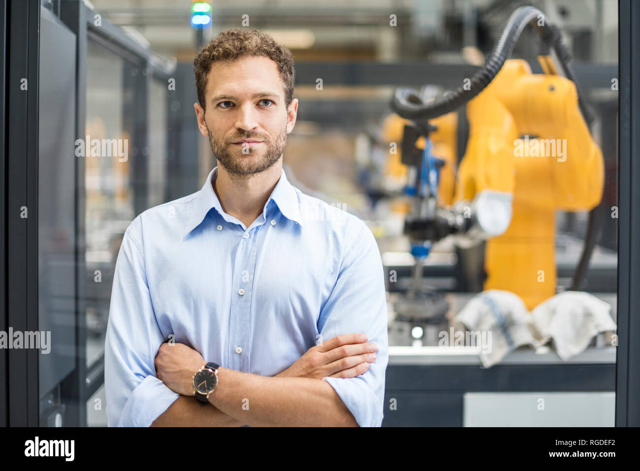 Businessman working in high tech company, portrait Banque D'Images