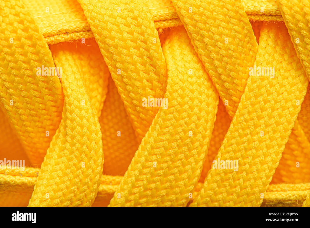 Close up of yellow sneakers lacets Banque D'Images
