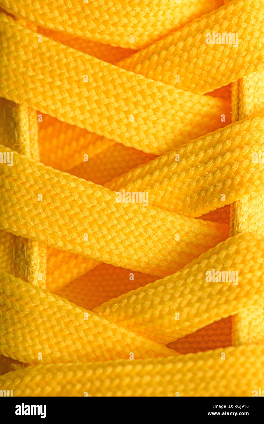 Close up of yellow sneakers lacets Banque D'Images