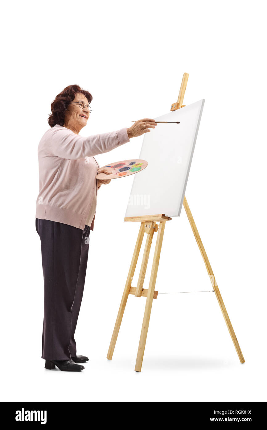 Tourné sur toute la longueur d'une femme âgée avec dessin sur toile isolé sur fond blanc Banque D'Images