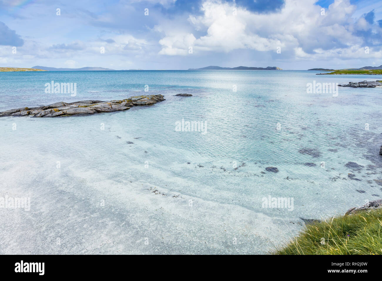 Paysage idyllique à marée basse, à l'île de Barra, îles Hébrides, Ecosse, Royaume-Uni Banque D'Images