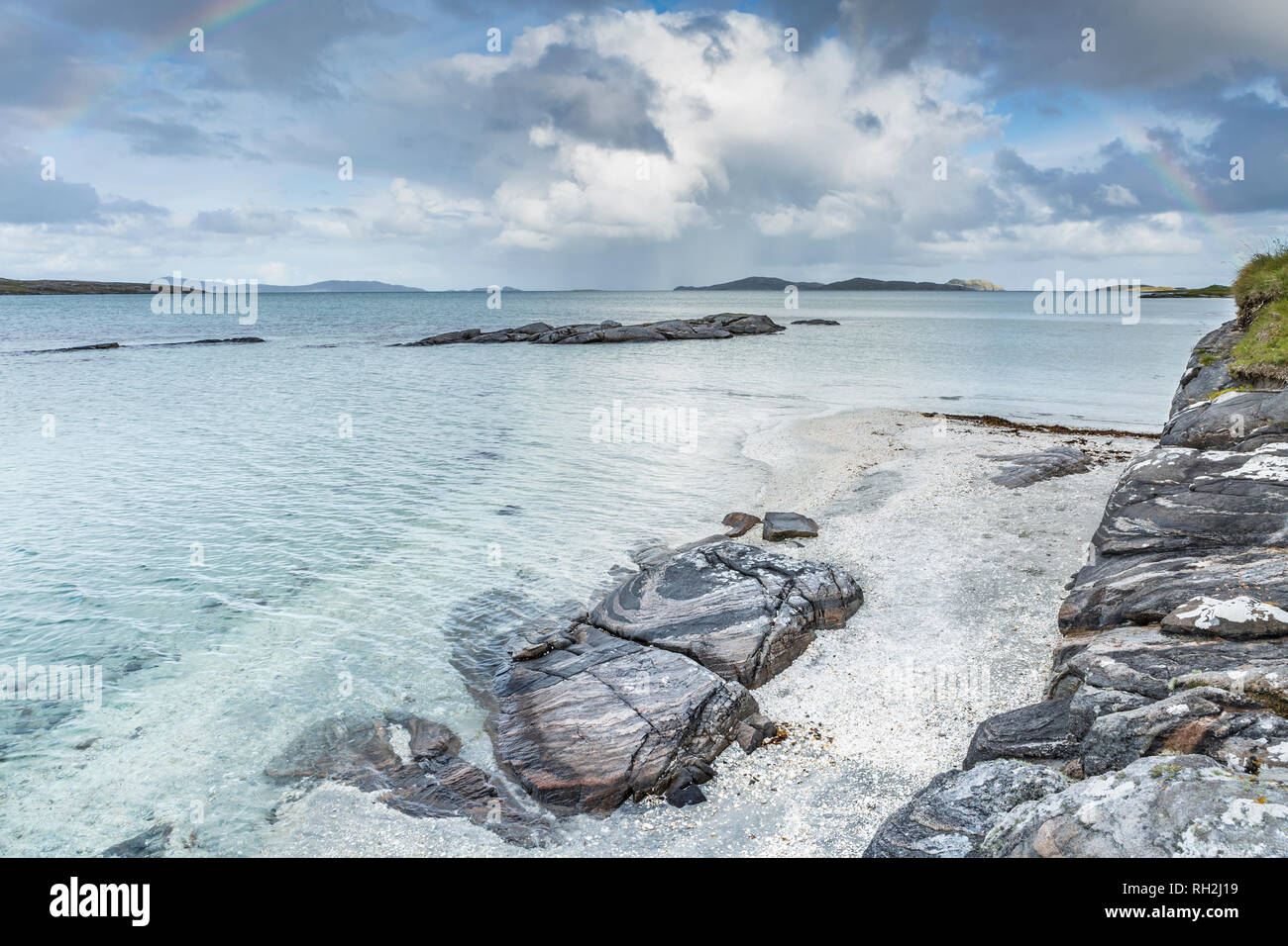Paysage idyllique à marée basse, à l'île de Barra, îles Hébrides, Ecosse, Royaume-Uni Banque D'Images