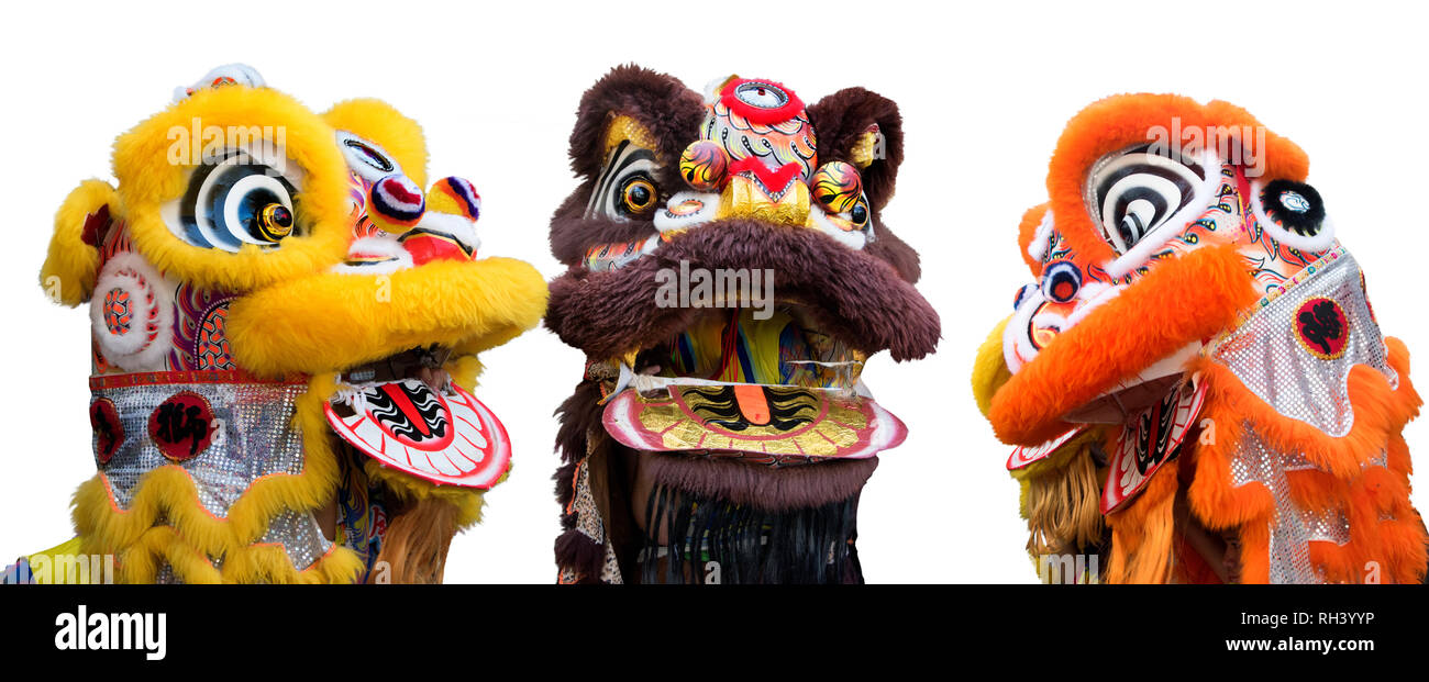 Groupe des costumes de danse du lion chinois isolé sur fond blanc Banque D'Images