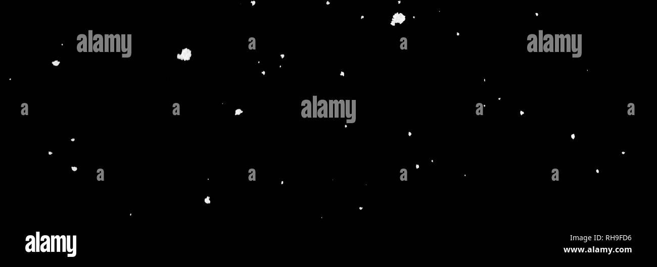 La chute des flocons de neige en face de fond noir Banque D'Images