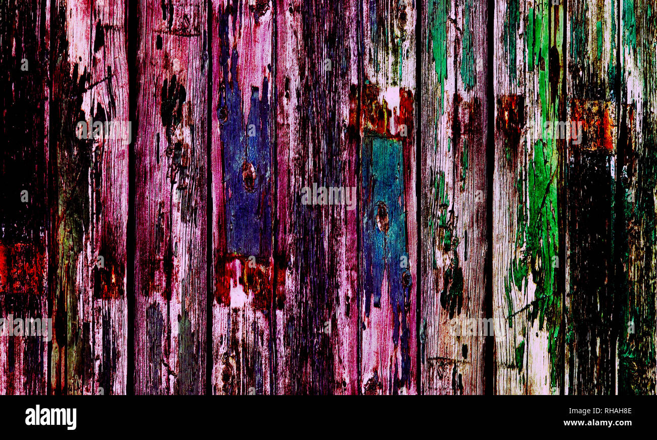 Vieille porte en bois multicolores avec peinture de floconneux Banque D'Images