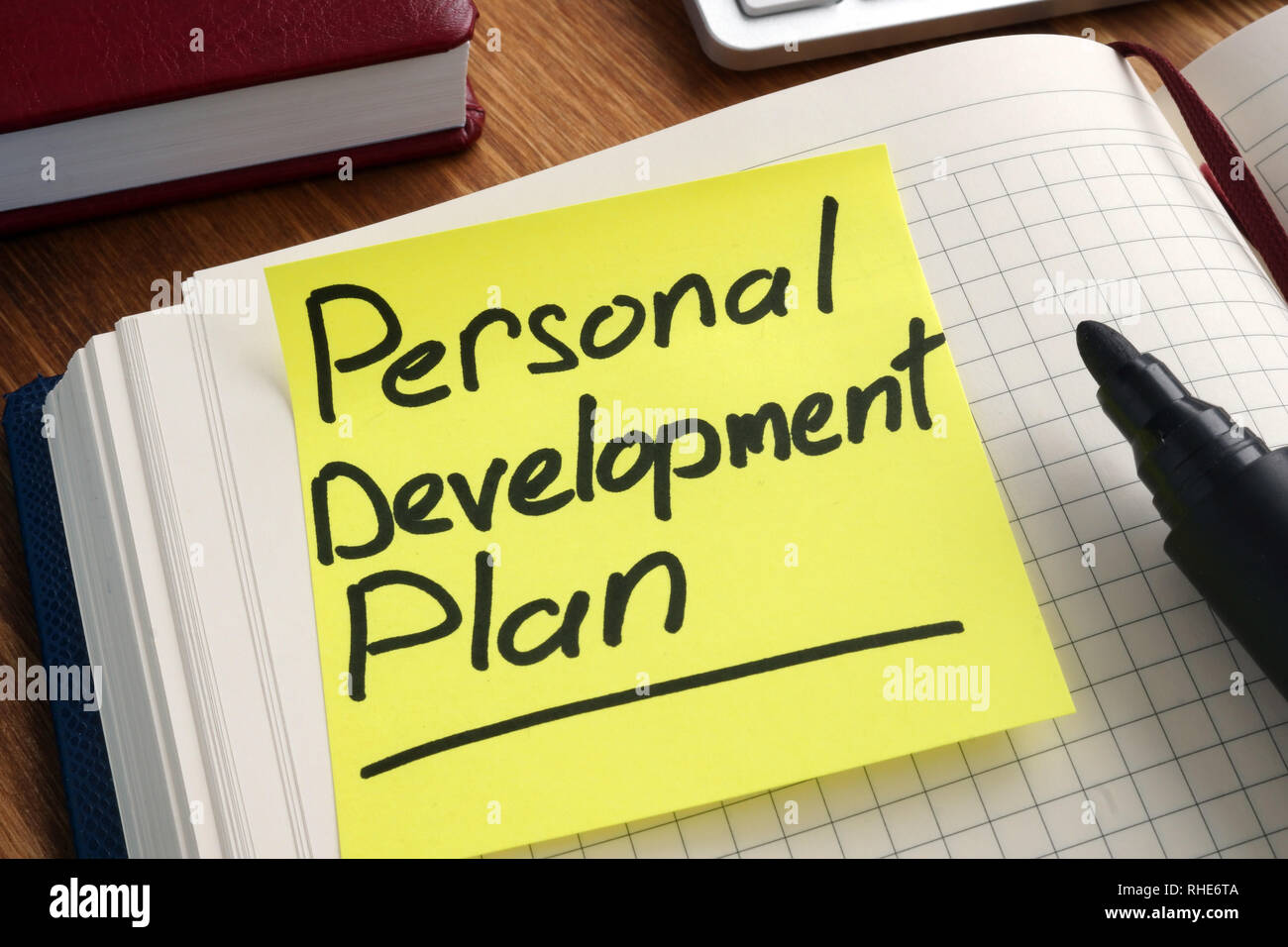 Plan de développement personnel. Memo stick dans le bloc-notes. Banque D'Images