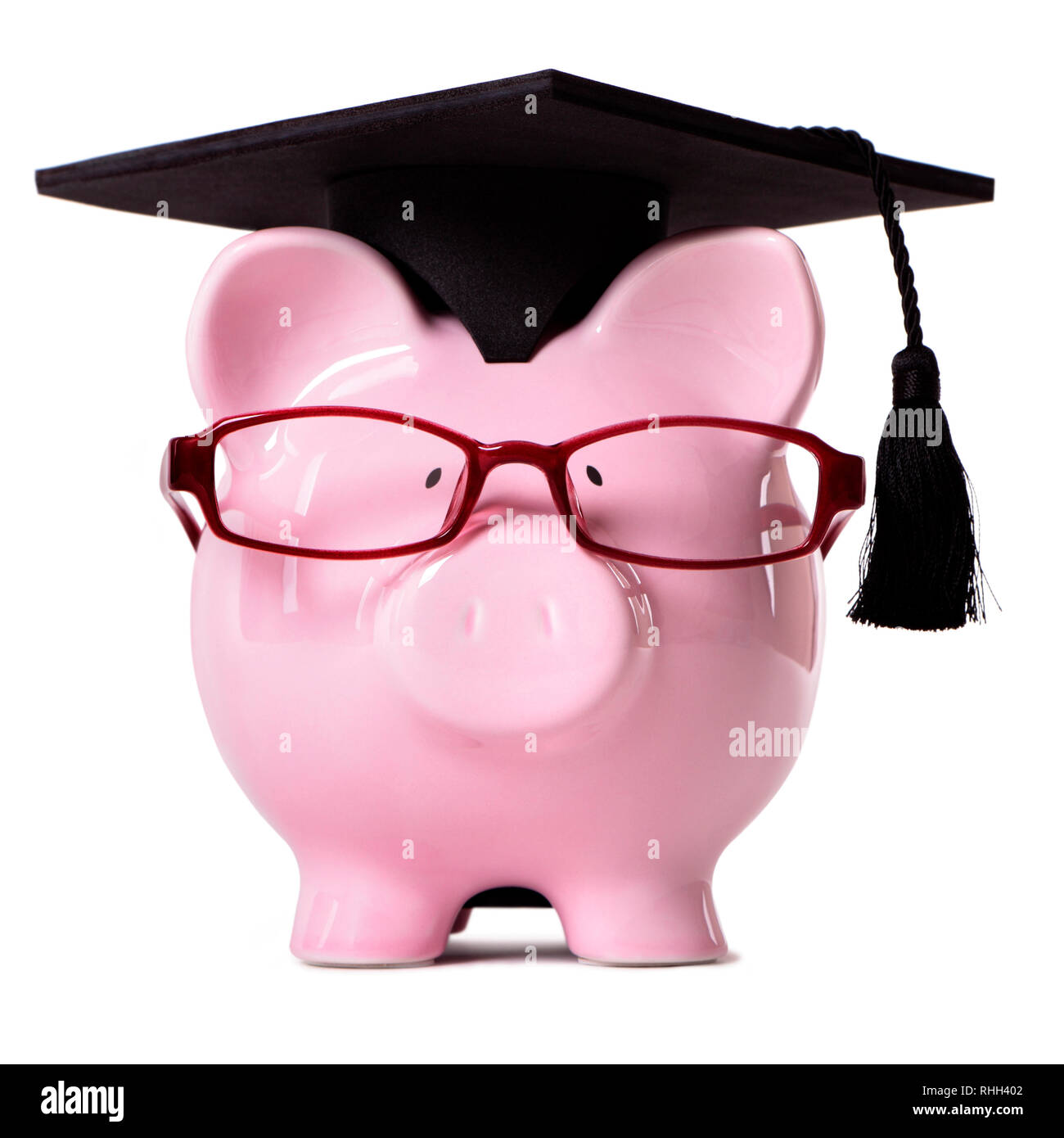 Pink piggy bank college student mortar board verres Banque D'Images