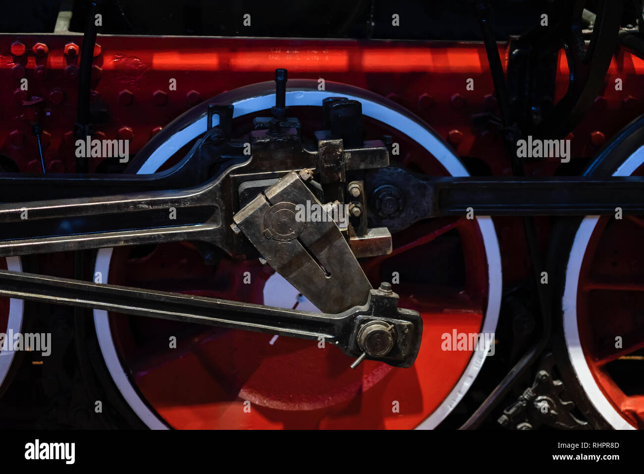 Partie de vapeur locomotive antique close up. Les roues rouges lumineux Abstract background vintage Banque D'Images