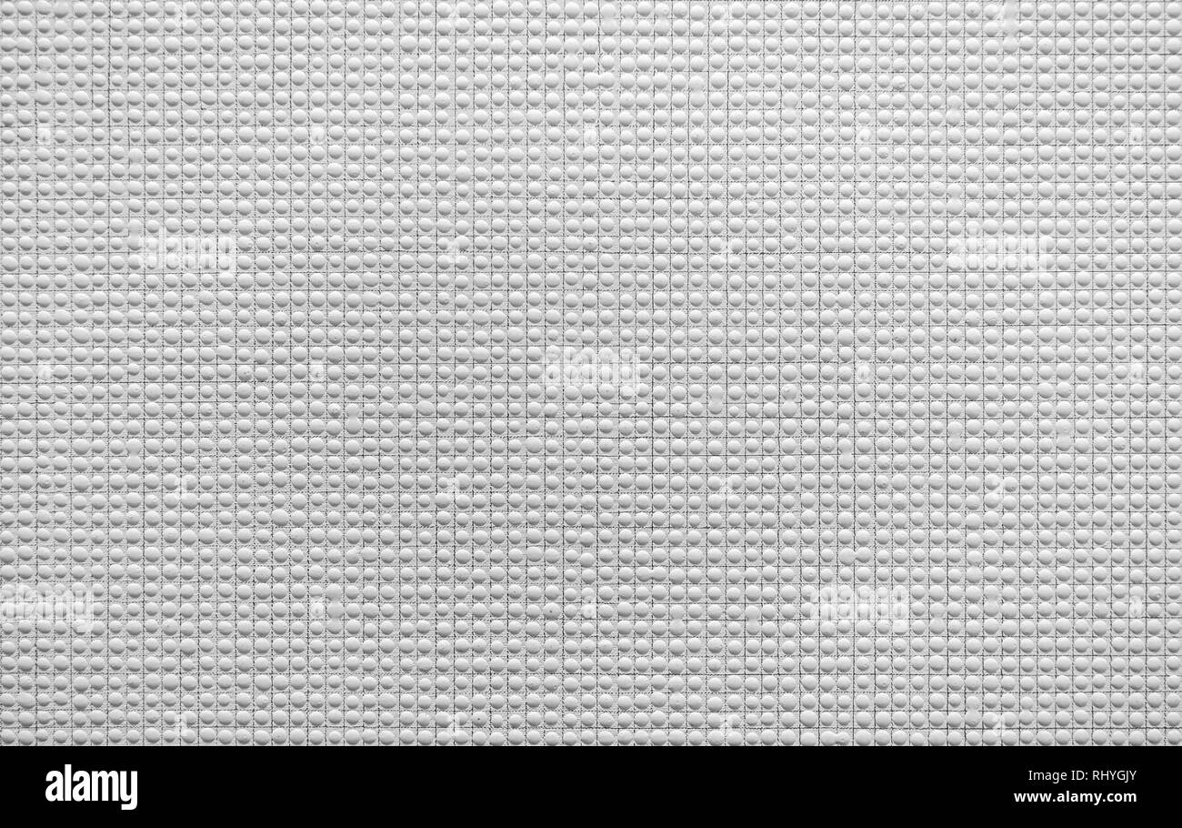 En pointillé blanc wall background : relief texture. Banque D'Images