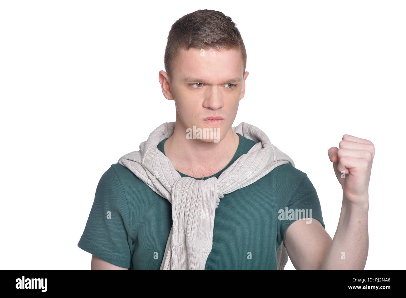 Portrait de studio de beau jeune homme sur fond blanc Banque D'Images