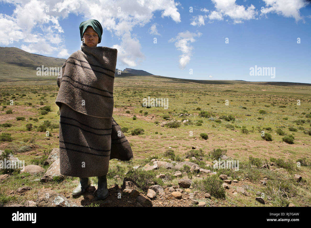 Hirtenjunge in den Bergen von Lesotho Banque D'Images