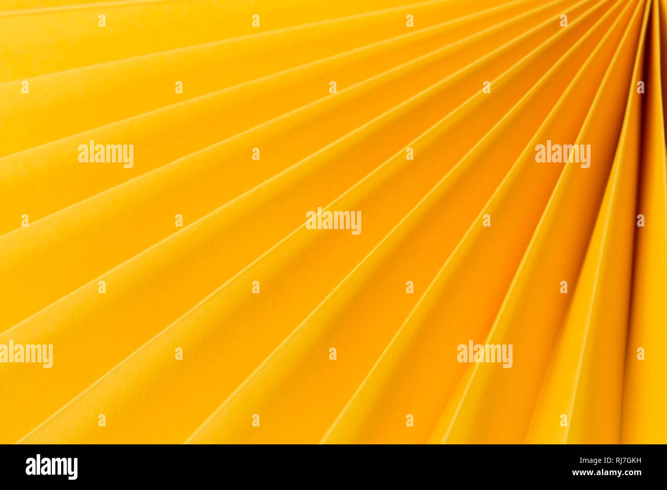 Plié papier fond décoratif jaune Banque D'Images