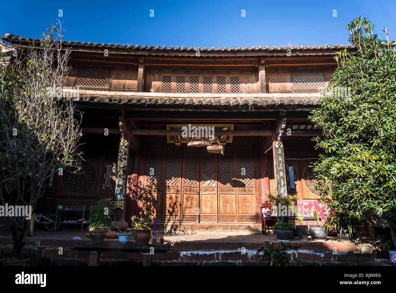 Ouyang Cour - un exemple de trois-en-un Bai l'architecture populaire dans lequel un mur protège trois résidences, Shaxi, marché de la ville historique, Yunnan, Banque D'Images