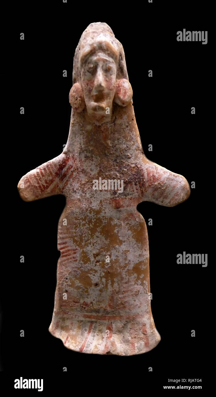 La figure en terre cuite d'une femme avec de grandes boucles d' ; faites en Béotie, en Grèce, à environ 550 av. Banque D'Images