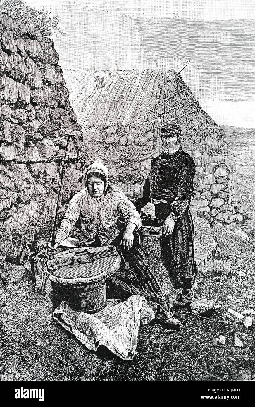 Une gravure représentant des crofters Skye maïs broyage à l'aide d'un moulin à meules ou à la main. En date du 19e siècle Banque D'Images